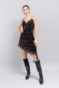 Abito asimmetrico in pizzo e paillettes da donna