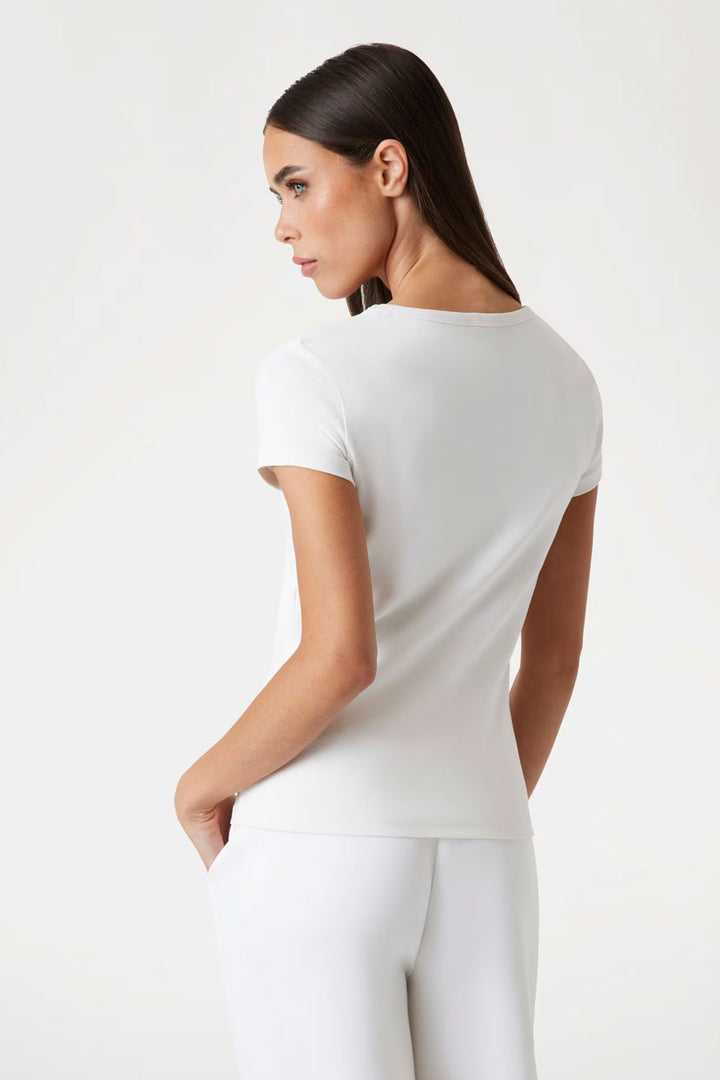 T-shirt panna con logo strass Guess